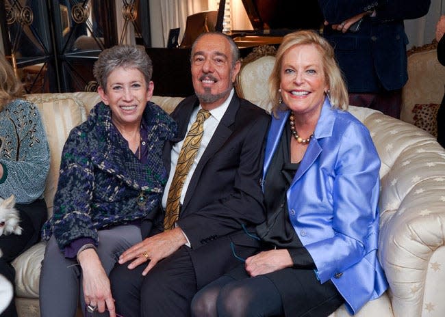 Marc Rosen with Beth Rudin DeWoody, left, and Carol Delouvrier at Rosen's cocktail party honoring Joan Collins and husband Percy Gibson.