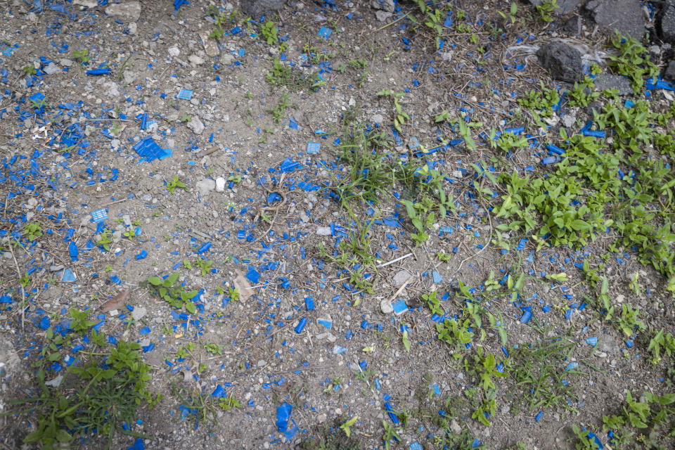 Nearly five years after Hurricane Maria struck Puerto Rico, pieces of blue roof tarp litter the ground in Loiza, Puerto Rico, Thursday, Sept. 15, 2022. The government has completed only 21% of more than 5,500 post-hurricane projects. In addition, more than 3,600 homes still have a tattered blue tarp serving as a makeshift roof. (AP Photo/Alejandro Granadillo)