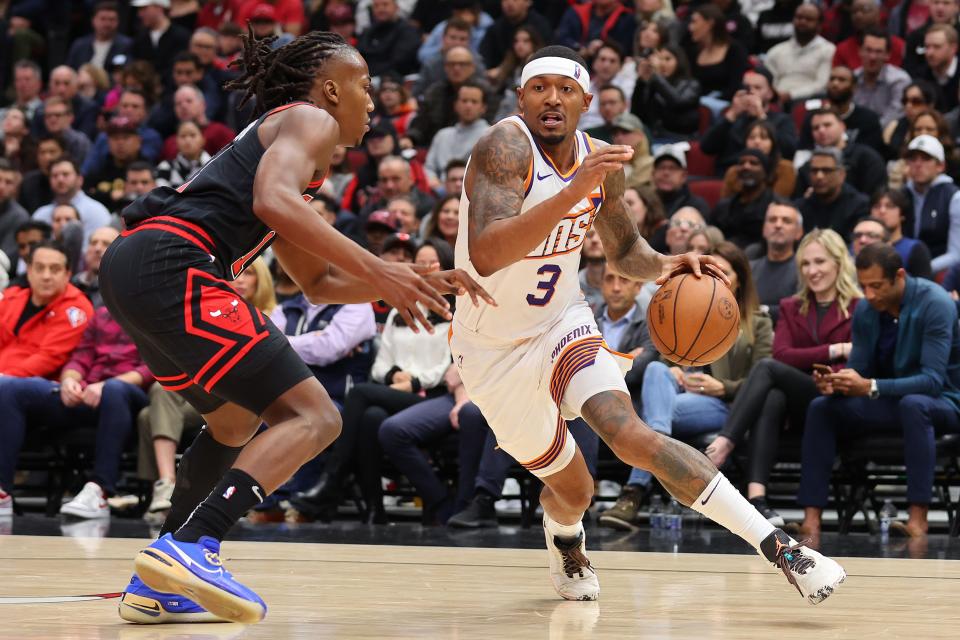 Bradley Beal #3 of the Phoenix Suns drives to the basket against Ayo Dosunmu #12 of the Chicago Bulls during the first half at the United Center on Nov. 8, 2023, in Chicago.