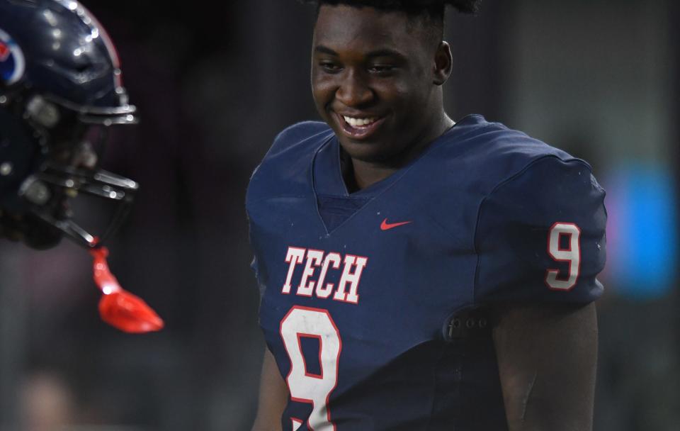 Antonio Camon of Tampa Bay Tech (9) talks with teammates on the sideline during second half of the Class 7A state championship game against St. Thomas at DRV PNK Stadium, Fort Lauderdale, FL  Dec. 17, 2021. 