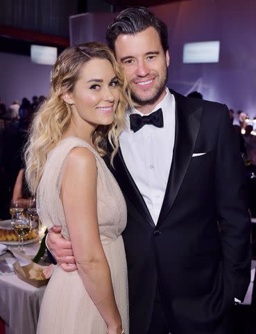 <p>Stefanie Keenan/Getty Images</p> Lauren Conrad and William Tell pose at the 2018 Baby2Baby Gala.
