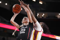 Stanford forward Cameron Brink, left, shoots as Southern California center Clarice Akunwafo defends during the first half of an NCAA college basketball game Sunday, Jan. 15, 2023, in Los Angeles. (AP Photo/Mark J. Terrill)