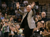 FILE - In this Oct. 19, 2007, file photo, Boston Celtics great Bob Cousy acknowledges applause from fans during a break in a preseason basketball game between the Celtics and New Jersey Nets in the second quarter of their preseason basketball game in Worcester, Mass. Cousy, who earned six NBA Championship rings, attended college at Holy Cross in Worcester. (AP Photo/Charles Krupa, File)