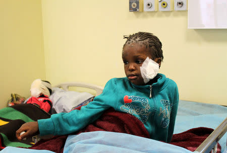 A girl, who Libyan forces said left the last cluster of buildings controlled by Islamic State in the group's former stronghold of Sirte, receives medical treatment in a hospital in Misrata, Libya December 4, 2016. REUTERS/Ayman Sahely