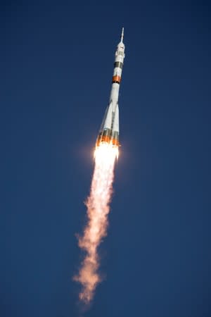 Russian Soyuz-2.1a booster with the Soyuz MS-14 spacecraft blasts off at the Baikonur Cosmodrome