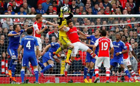 Football - Arsenal v Chelsea - Barclays Premier League - Emirates Stadium - 26/4/15 Chelsea's Thibaut Courtois in action with Arsenal's Olivier Giroud Reuters / Eddie Keogh Livepic EDITORIAL USE ONLY.