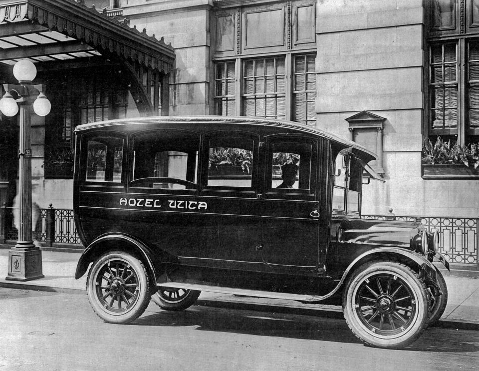 Hotel Utica first opened its doors in March 1912 and its owners quickly decided that it should provide shuttle service for guests between the hotel and the railroad depot on Main Street (on the site of today’s Union Station). They asked the Willoughby Company—at Dwyer Avenue and Turner Street—to build them a bus. The auto body-building company did just that and it was a beauty. The bus seated 11 plus the driver and it had a rich, glossy blue exterior and a lush interior. It was powered by a 24-horsepower engine.