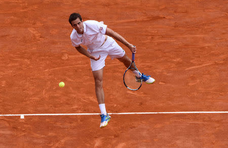 Tennis - Monte Carlo Masters - Monaco, 23/04/2017. Rafael Nadal of Spain serves to his compatriot Albert Ramos-Vinolas in the final of the Monte Carlo Masters. REUTERS/Jean-Pierre Amet