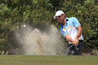 MELBOURNE, AUSTRALIA - NOVEMBER 18: Charl Schwartzel of the International Team plays a shot out of the bunker on the ninth hole during the Day Two Four-Ball Matches of the 2011 Presidents Cup at Royal Melbourne Golf Course on November 18, 2011 in Melbourne, Australia. (Photo by Mark Dadswell/Getty Images)