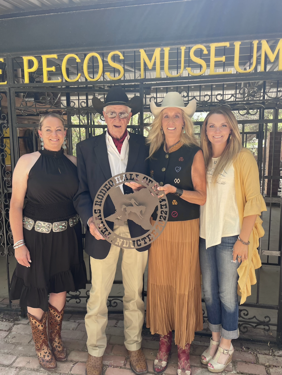 Angela Ganter (second from right) poses after being inducted into the Texas Rodeo Hall of Fame on June 24 in Pecos.