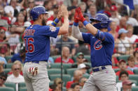 Chicago Cubs' Nico Hoerner, right, is congratulated by teammate Patrick Wisdom after hitting a two-run home run during the second inning of a baseball game against the St. Louis Cardinals Friday, June 24, 2022, in St. Louis. (AP Photo/Jeff Roberson)