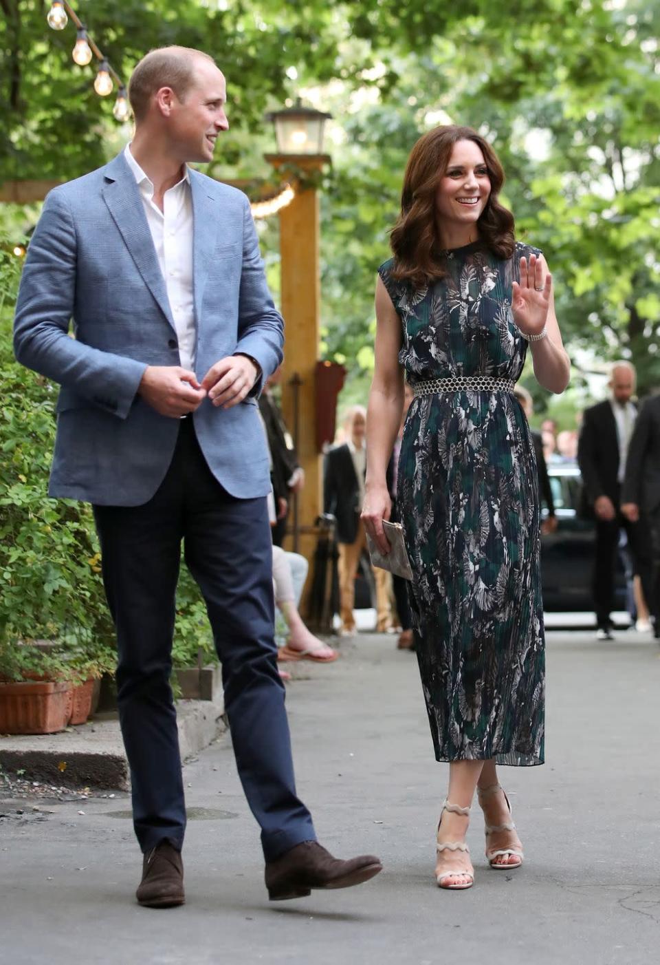 <p>Okay, before you get all “wait, Meghan and Kate’s dresses look <em>nothing </em>alike<em>,</em>” please note the length of Kate’s dress and its cut and belt detail. This is a Markus Lupfer dress, by the way, which the Duchess wore in Berlin in 2017. </p>