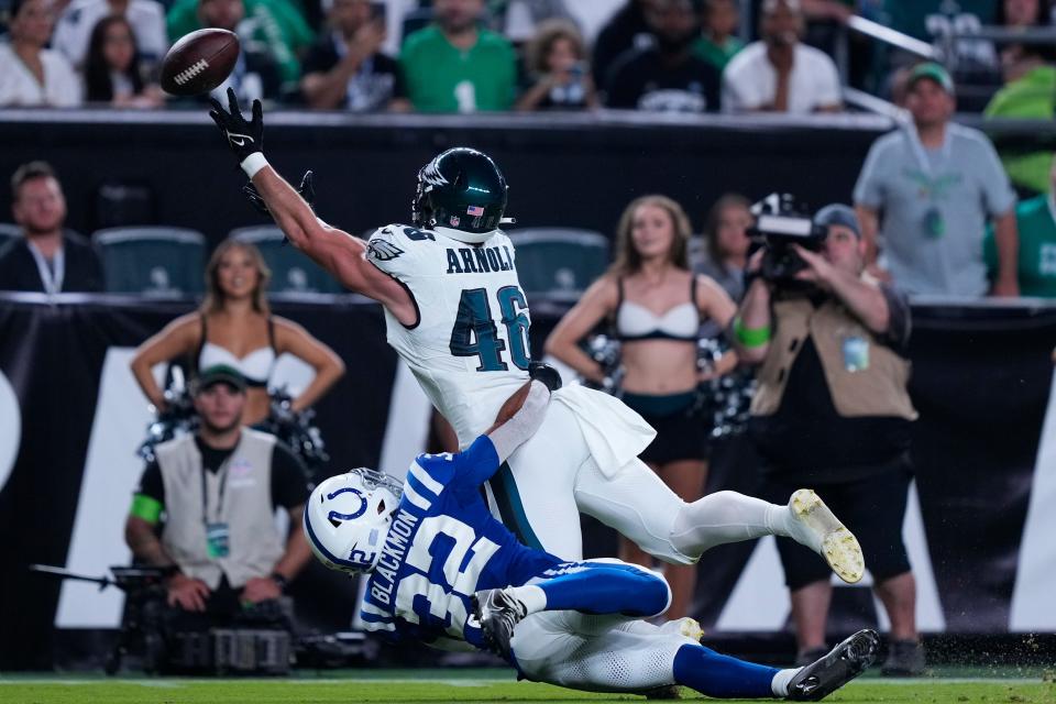 Philadelphia Eagles tight end Dan Arnold (46) can't catch a pass in front of Indianapolis Colts safety Julian Blackmon (32) during the first half of an NFL preseason football game Thursday, Aug. 24, 2023, in Philadelphia. (AP Photo/Matt Rourke)