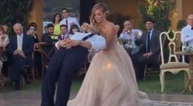 Magician groom Justin Willman and his comedian wife Jill pulled out all the stops for their first dance. Photo: YouTube