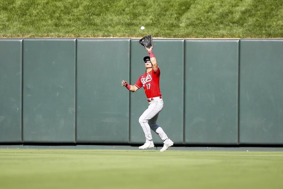 Cincinnati Reds center fielder Stuart Fairchild catches for an out against St. Louis Cardinals' Richie Palacios during the fifth inning of a baseball game, Sunday, Oct. 1, 2023, in St. Louis. (AP Photo/Scott Kane)