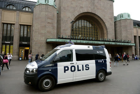Finnish police patrol in front of the Central Railway Station, after stabbings in Turku, in Central Helsinki, Finland August 18, 2017. LEHTIKUVA/Linda Manner via REUTERS