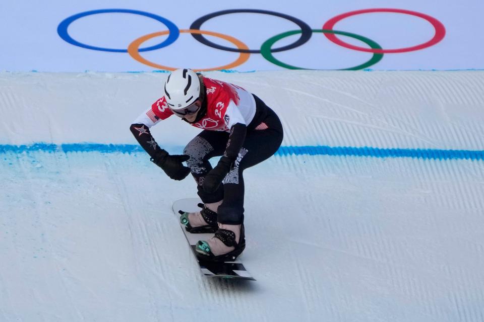 United States' Meghan Tierney competes during the women's snowboard cross qualification round at the 2022 Winter Olympics, Wednesday, Feb. 9, 2022, in Zhangjiakou, China. (AP Photo/Aaron Favila)