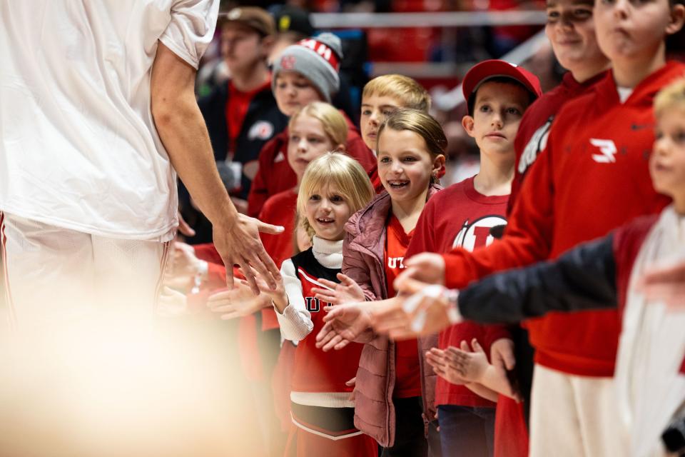 Fans line the court as the Utah Utes enter before a men’s college basketball game between the University of Utah and Washington State University at the Jon M. Huntsman Center in Salt Lake City on Friday, Dec. 29, 2023. | Megan Nielsen, Deseret News