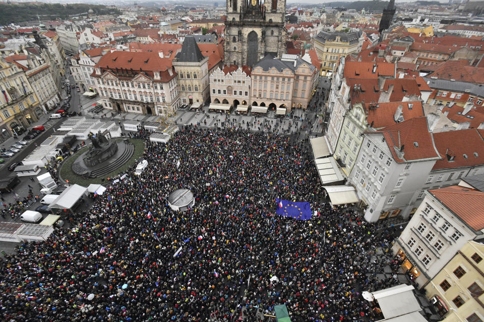 Thousands of people take part in a march in the centre of Prague, Monday April 29, 2019, to protest the proposed replacement of the justice minister. The protesters said Monday it might compromise the legal system at a time when prosecutors have to decide whether to indict Prime Minister Andrej Babis over alleged fraud involving European Union funds. (Vit Simanek/CTK via AP)