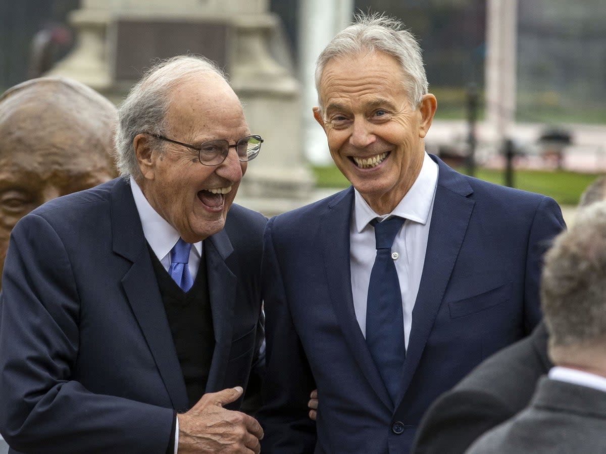 Former US senator George Mitchell (left) with former PM Sir Tony Blair (PA)