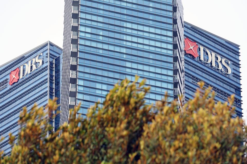 Signage for DBS Group Holdings Ltd. atop a building in Singapore, on Monday, July 31, 2023. DBS is scheduled to report earnings results on Aug. 3.