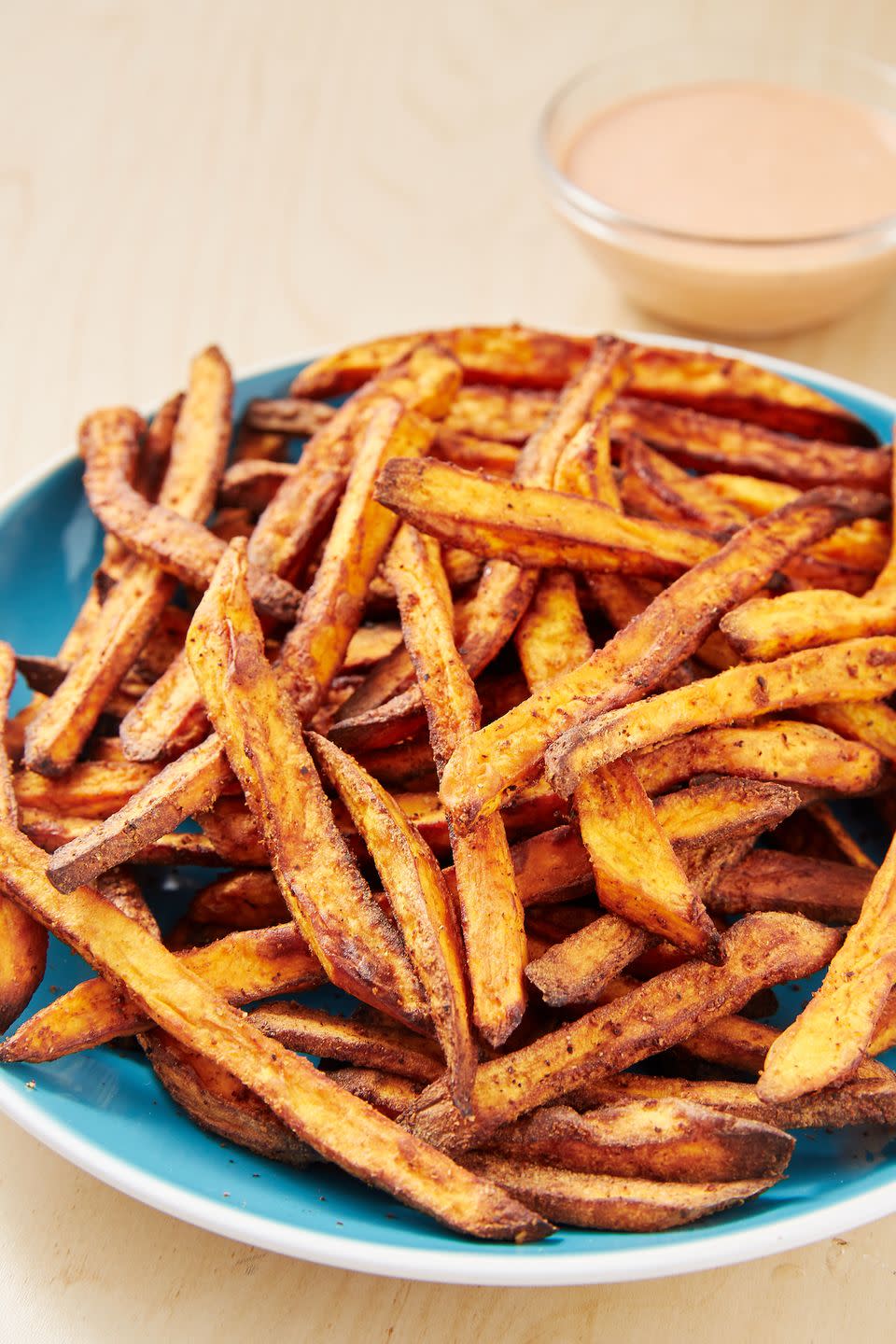 <p>We love a good, crispy <a href="https://www.delish.com/cooking/recipe-ideas/recipes/a45026/salt-n-pepper-sweet-potato-fries-recipe/" rel="nofollow noopener" target="_blank" data-ylk="slk:sweet potato fry;elm:context_link;itc:0;sec:content-canvas" class="link ">sweet potato fry</a>. Though the oven-baked variety is great, these air fryer fries get even crispier and take way less time! Paired with our favorite 3-ingredient secret sauce (use vegan mayo!), we can't think of a better snack.</p><p>Get the <strong><a href="https://www.delish.com/cooking/recipe-ideas/a28136123/air-fryer-sweet-potato-recipe/" rel="nofollow noopener" target="_blank" data-ylk="slk:Air Fryer Sweet Potato Fries recipe;elm:context_link;itc:0;sec:content-canvas" class="link ">Air Fryer Sweet Potato Fries recipe</a></strong>.</p>