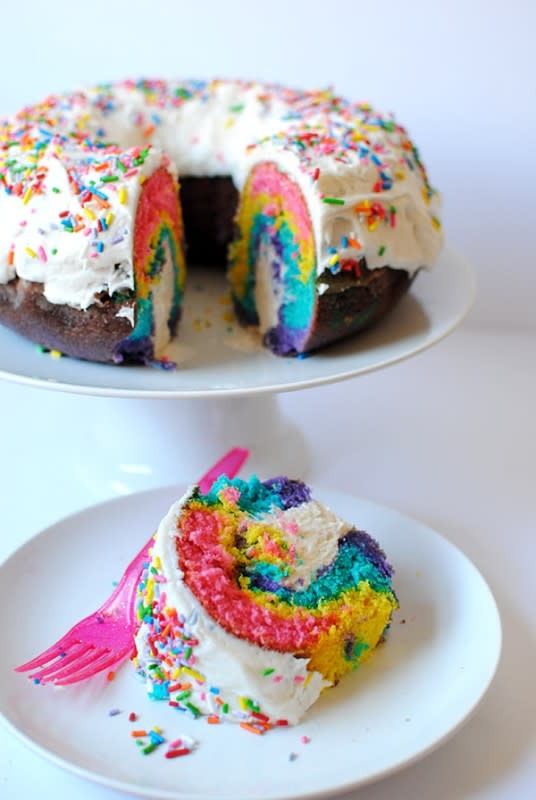 <p>This rainbow unicorn cake with Twinkie filling is perfect for brightening up any day!</p><p><strong>Get the recipe: <a href="https://www.letseatcake.com/rainbow-unicorn-cake-twinkie-filling/" rel="nofollow noopener" target="_blank" data-ylk="slk:Rainbow Unicorn Cake with Twinkie Filling;elm:context_link;itc:0;sec:content-canvas" class="link "><em>Rainbow Unicorn Cake with Twinkie Filling</em></a></strong></p>