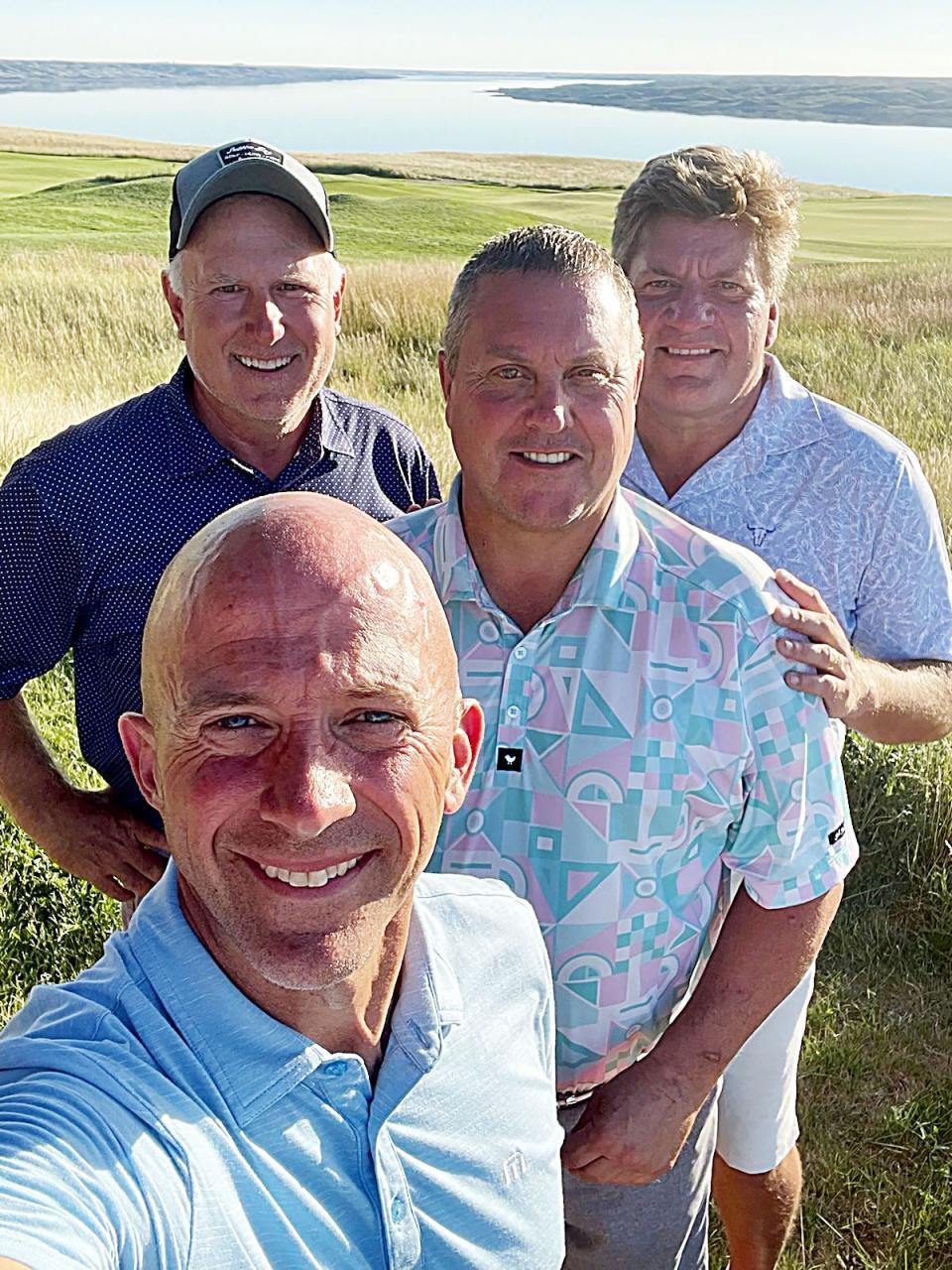 Watertown golfers Eric Stevens (front), Dan Thorson (center), Mike Strandell (back left) and Jeff Orthaus pose for a picture recently at the Sutton Bay Golf Course near Agar. On Tuesday, Aug. 30, Strandell recorded a rare hole-in-one on the par-4, 300-yard No. 4 hole at the course. Odds of recording an albratross (a hole-in-one on a par 4 or a double-eagle on par 5) are considered to be a million-to-one or greater.
