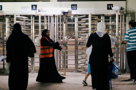 Saudi women arrive to watch the soccer match between Al-Ahli against Al-Batin at the King Abdullah Sports City in Jeddah, Saudi Arabia January 12, 2018. REUTERS/Reem Baeshen