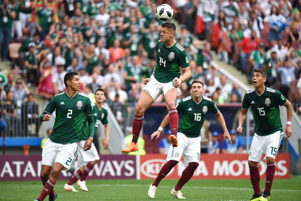 <p>Mexico’s forward Javier Hernandez (C) heads the ball during the Russia 2018 World Cup Group F football match between Germany and Mexico at the Luzhniki Stadium in Moscow on June 17, 2018. (Photo by Kirill KUDRYAVTSEV / AFP) </p>