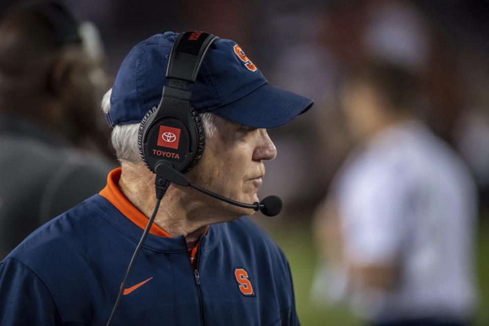 Syracuse coach Dino Babers watches during the second half of the team's NCAA college football game against Syracuse on Thursday, Oct. 26, 2023, in Blacksburg, Va. (AP Photo/Robert Simmons)