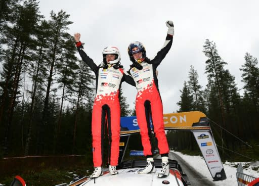Elfyn Evans and co-driver Scott Martin after guiding their Toyota to victory at Rally Sweden