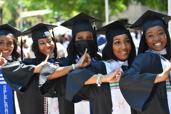 girls in a sorority posing together at their graduation