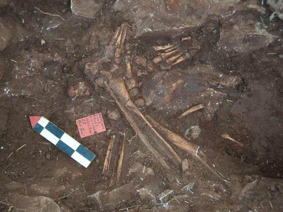 An adult human burial in the cave Alepotrypa.