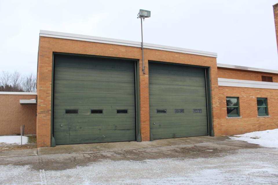 The armory has two large garage doors on the south side of the building, which had been used by the Michigan Army National Guard when the facility was open.