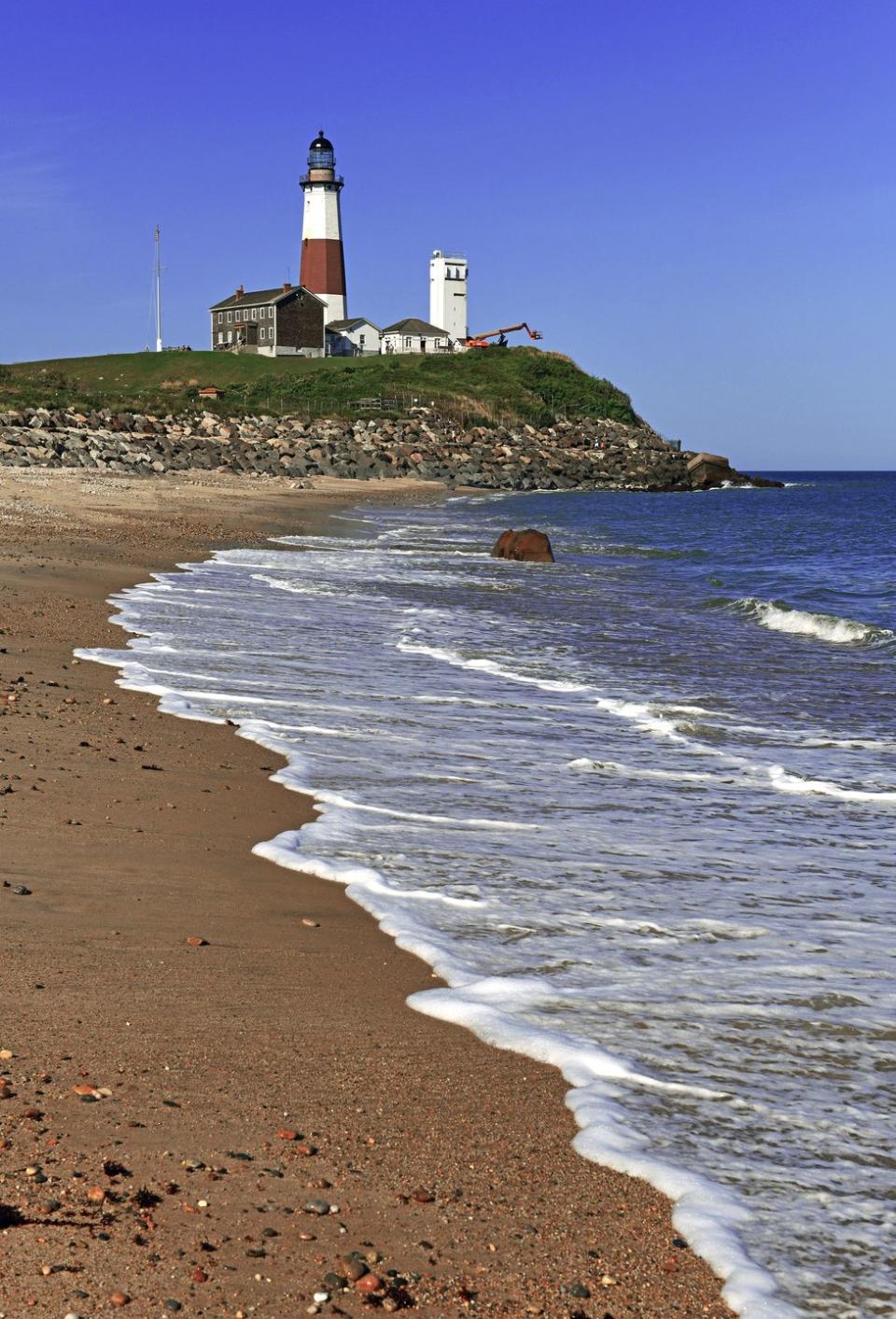 coastal scene with montauk lighthouse on atlantic ocean, long island, new york