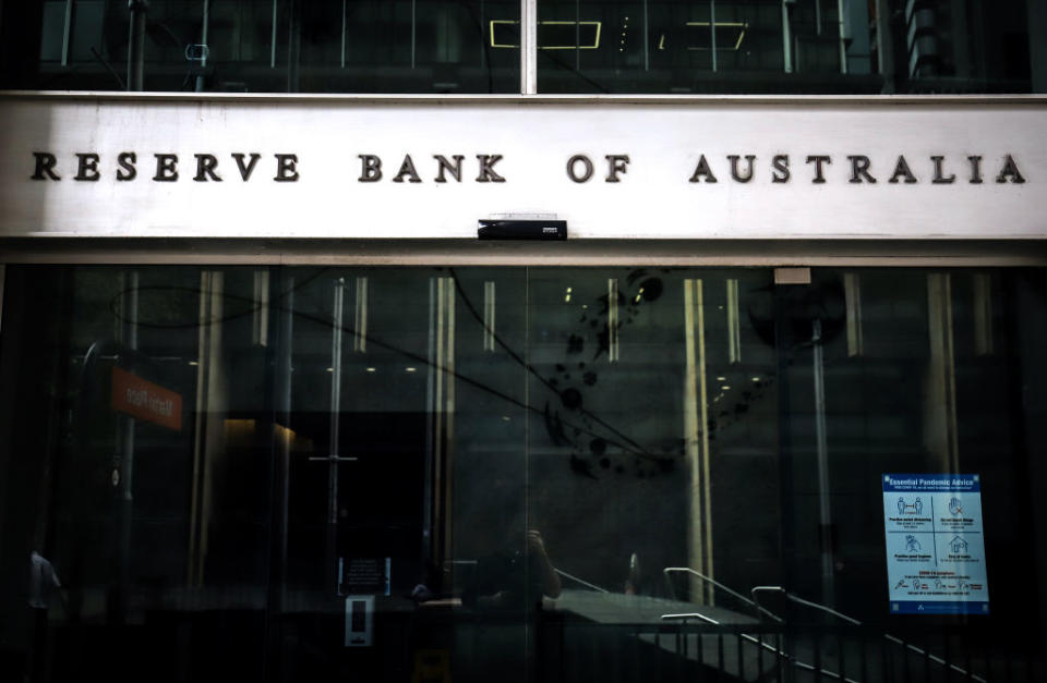 A sign is displayed on a door at an entrance to the Reserve Bank of Australia (RBA) building, during a partial lockdown imposed due to the coronavirus, in Sydney, Australia, on Monday, May 18, 2020. Australia. (Photographer: David Gray/Bloomberg via Getty)