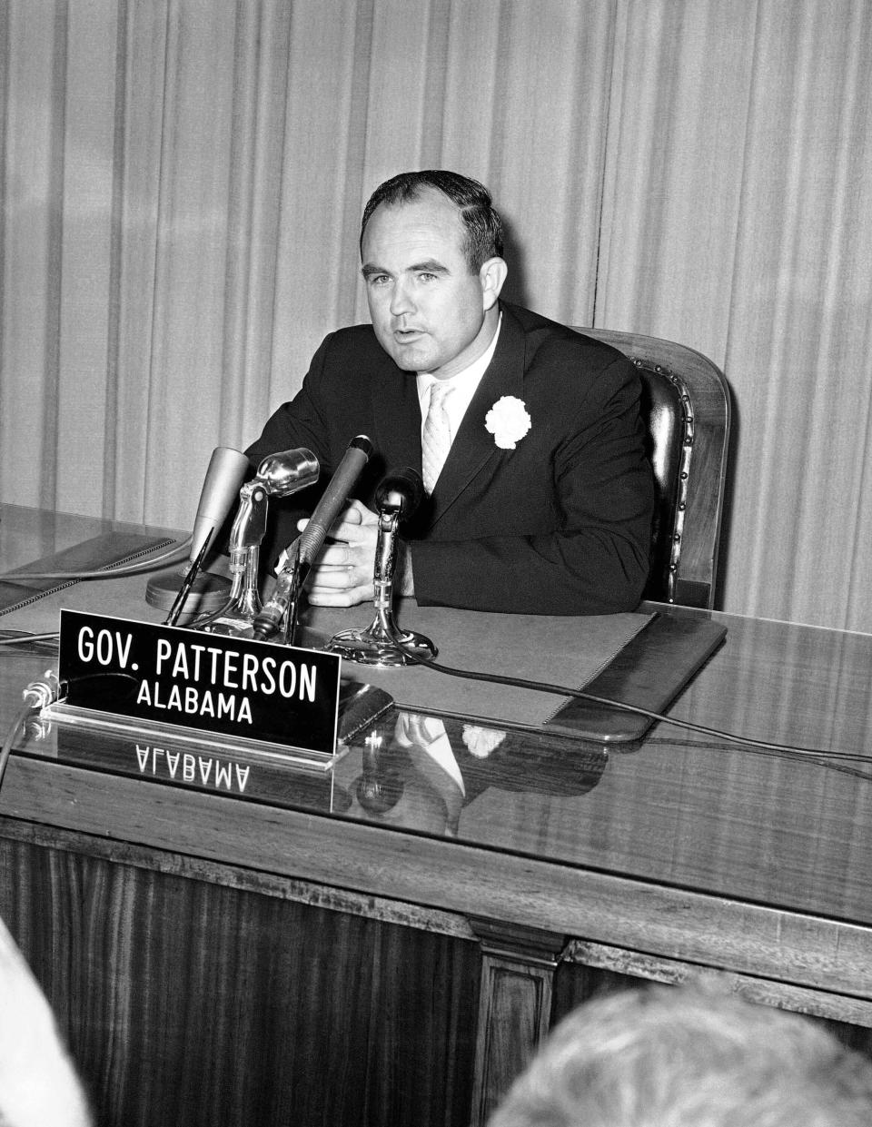 File- This May 23, 2961, file photo shows Alabama Gov. John Patterson telling news conference in Montgomery, Ala., that the federal government is responsible for rioting in the capital city. Patterson, who entered politics as a reformer after his father’s assassination but was criticized for failing to protect the Freedom Riders from angry white mobs, has died. He was 99. He died Friday, June 4, 2021, his daughter, Barbara Patterson Scholl confirmed Saturday, June 5, 2021. She said funeral arrangements are pending. (AP Photo/Horace Cort, File )