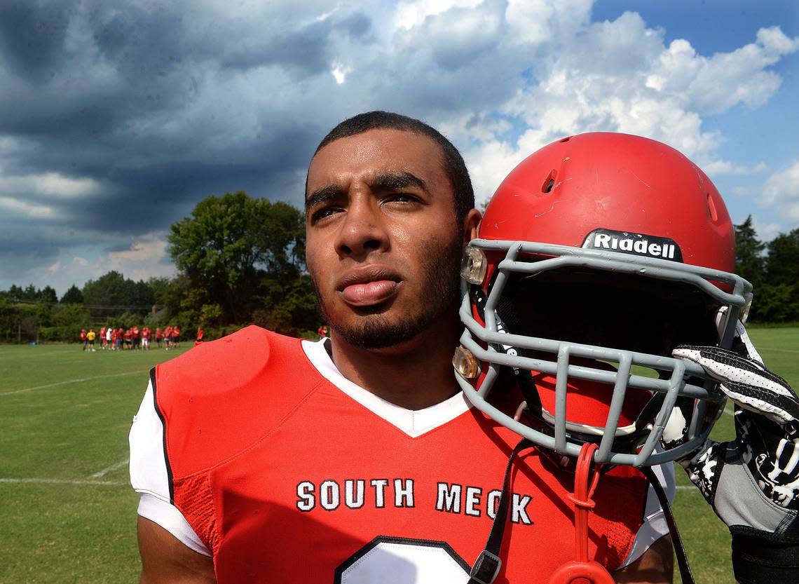 Jake Lawler, photographed at the South Mecklenburg High School practice fields back when he was a star defensive end for the Sabres.