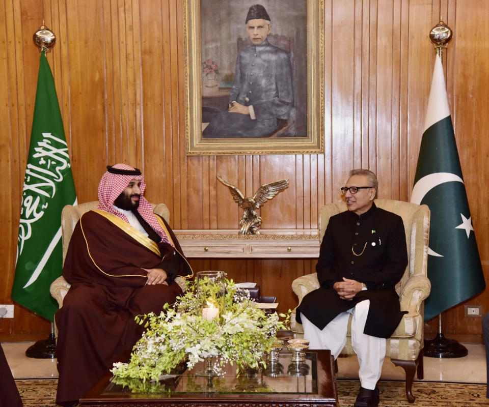 In this photo released by the Press Information Department, Pakistani President Arif Alvi, right, meets with visiting Saudi Arabia's Crown Prince Mohammed bin Salman at presidential palace in Islamabad, Pakistan, Monday, Feb. 18, 2019. A senior Saudi diplomat on Monday assailed Iran for initially blaming the kingdom for last week's attack that killed 27 members of Iran's elite Revolutionary Guard. (Press Information Department, via AP)