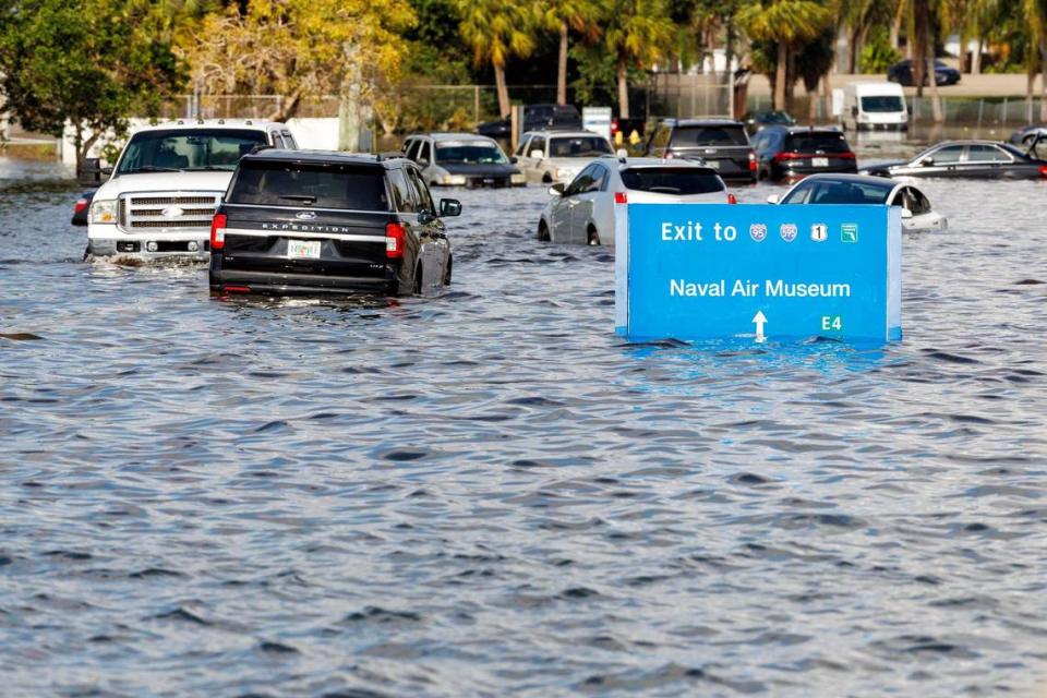 Vehicles on flooded West Perimeter Road in Fort Lauderdale on Thursday, April 13, 2023.