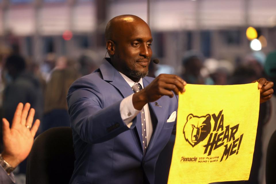 Memphis Grizzlies announcer Brevin Knight holds up a 'Ya Hear Me' towel before the team takes on the Utah Jazz for Game 3 of their playoff series on Saturday, May 29, 2021. 