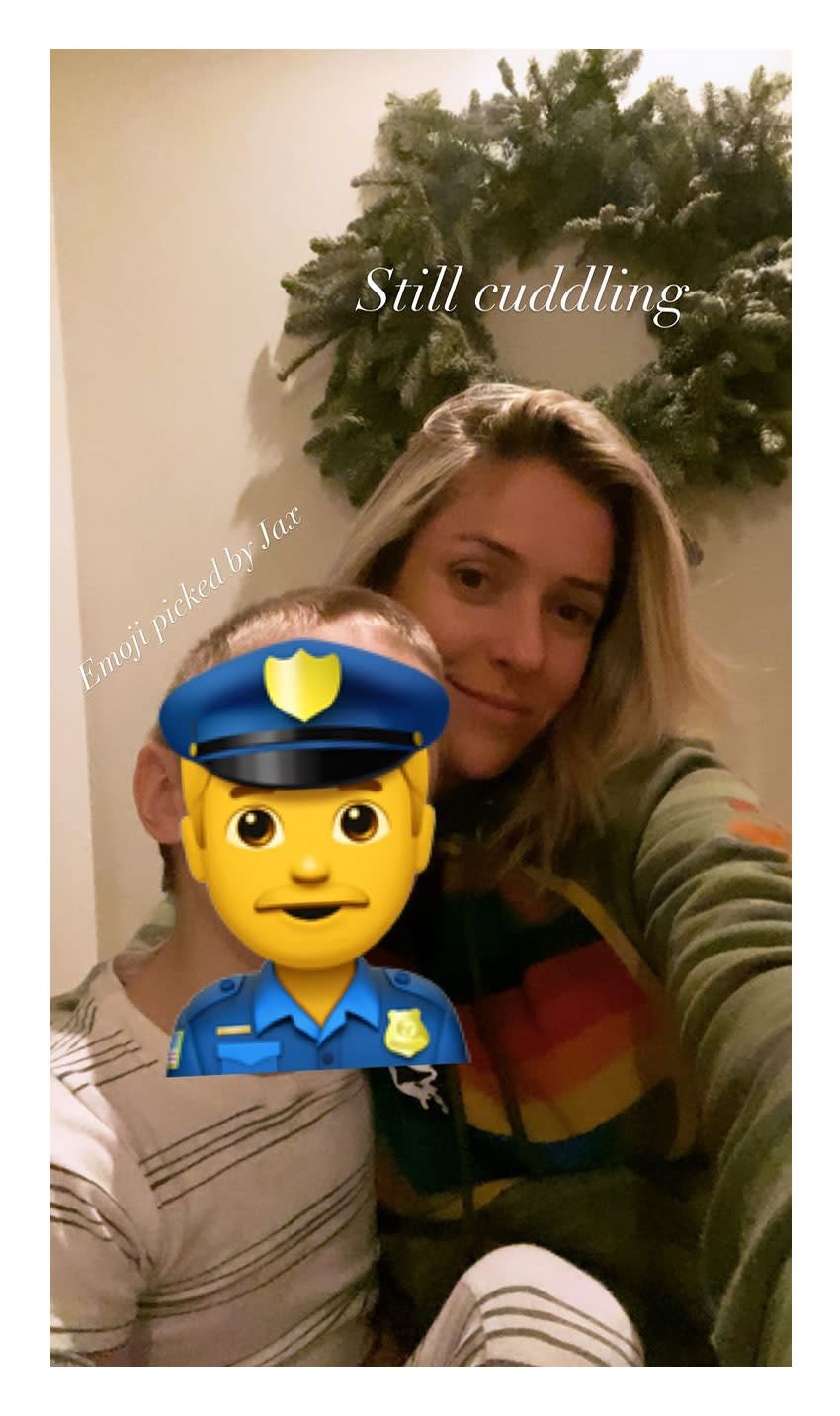 Cavallari snapped a selfie while enjoying "movies and cuddles" with Jaxon, covering his face with an emoji.