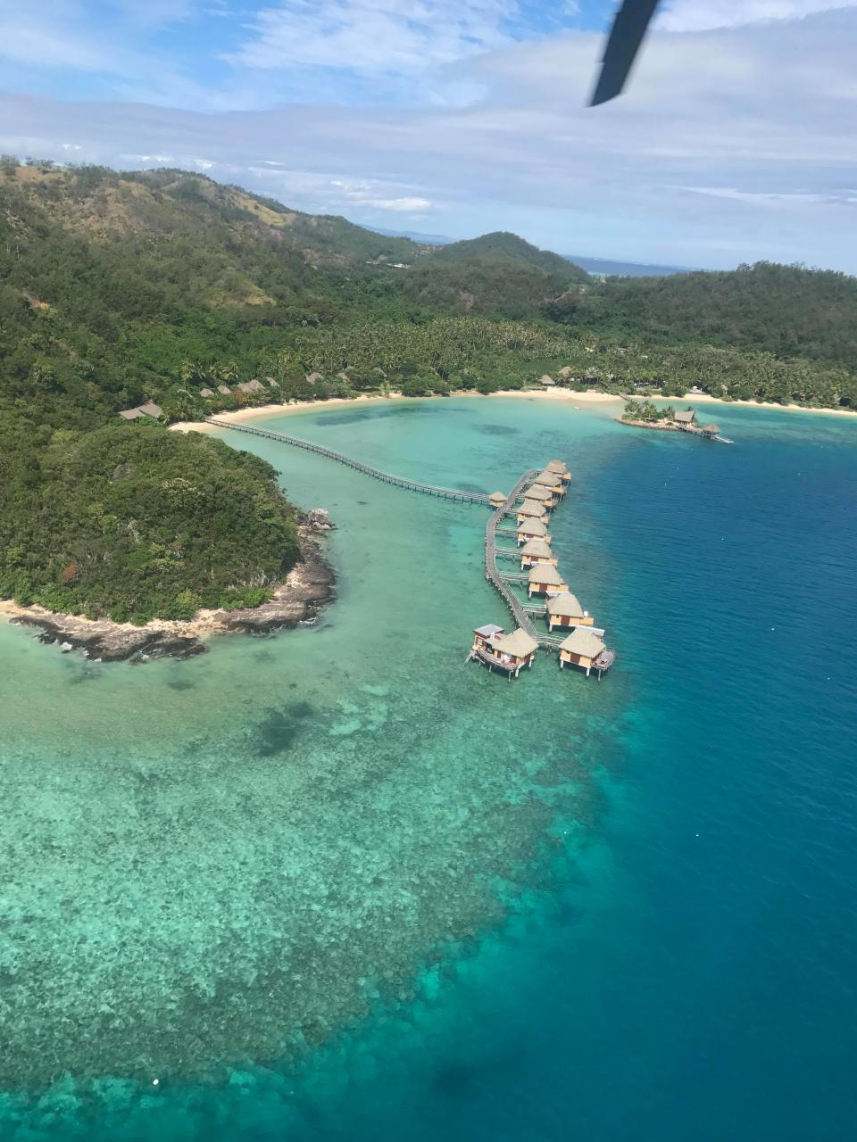 Fiji’s first and only authentic overwater bungalows: Likuliku Lagoon Resort. Photo: Carly Williams/Be