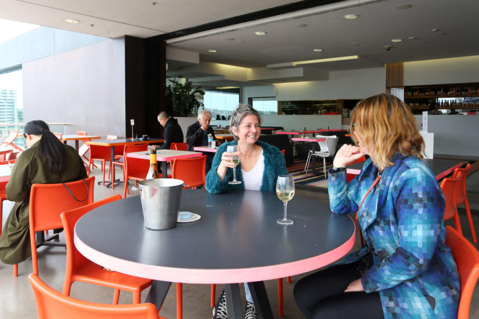 Patrons return to the MCA Cafe (Museum of Contemporary Art Australia) in Sydney, Australia. 