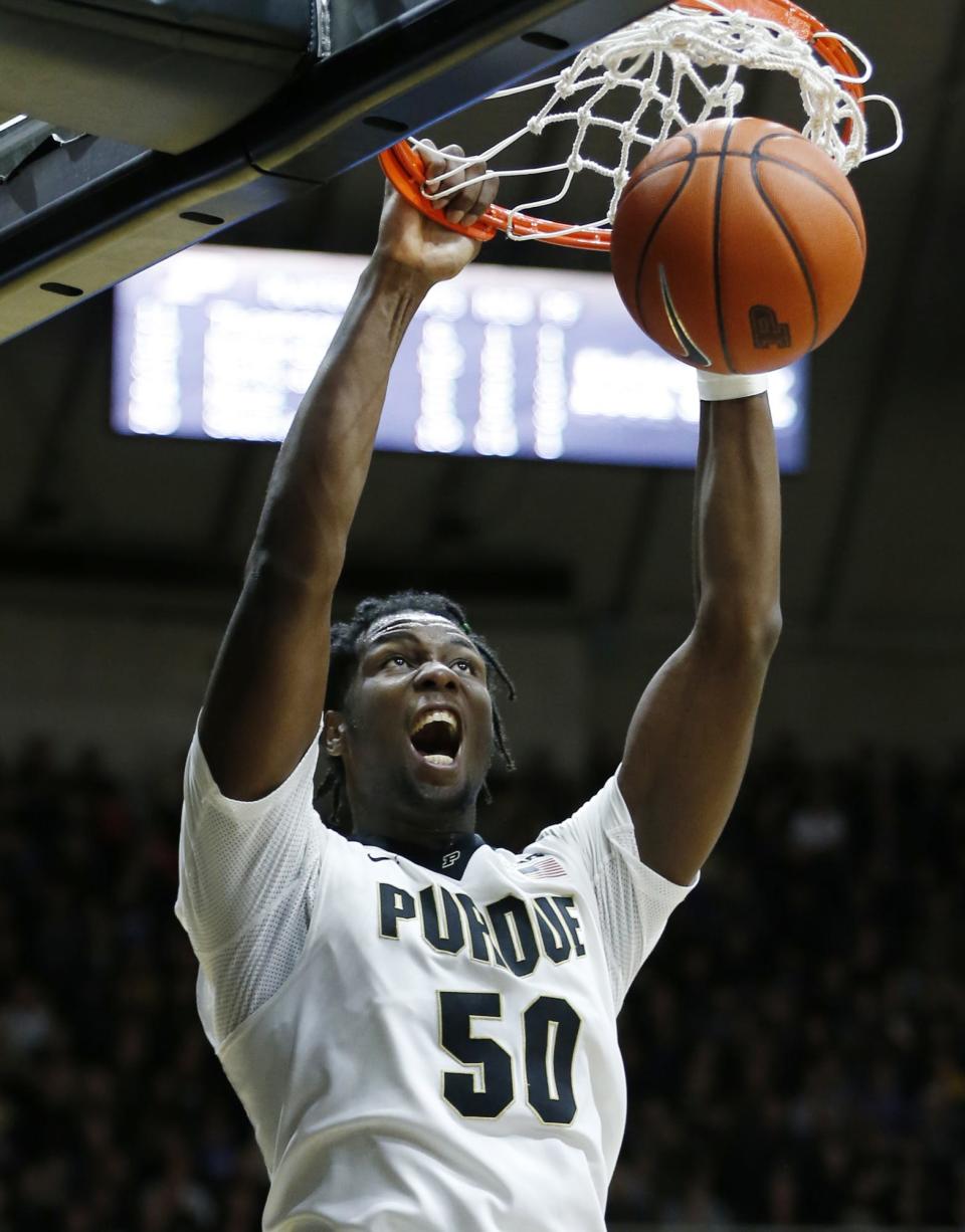 Caleb Swanigan dunks against New Jersey Institute of Technology in 2016. (John Terhune, Journal & Courier)