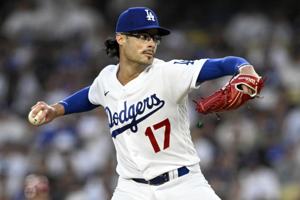 Los Angeles Dodgers relief pitcher Joe Kelly throws to a Cincinnati Reds batter during the sixth inning of a baseball game in Los Angeles, Saturday, July 29, 2023. (AP Photo/Alex Gallardo)