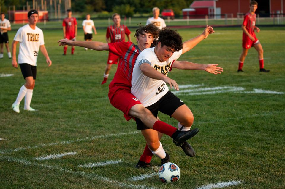 Westfall's Beau Hunt (22) tries to get the ball from Miami Trace's Pierce McCarty (32) in varsity boys soccer action at Westfall High School on Aug. 25, 2022 in Williamsport, Ohio.