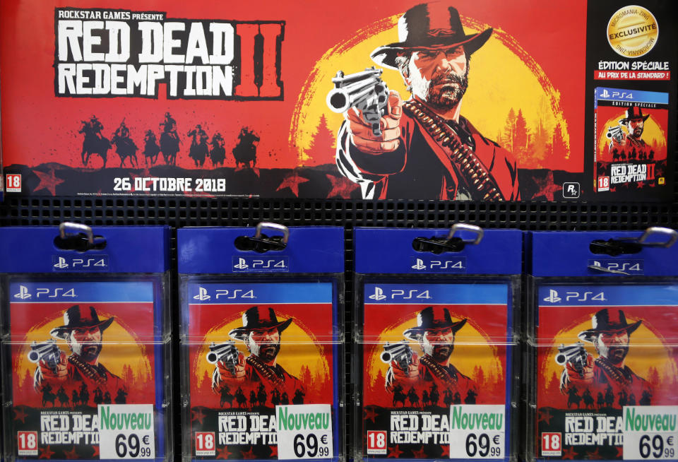 PARIS, FRANCE - OCTOBER 27:  Red Dead Redemption 2 (RD 2) video games for Sony PlayStation PS4 developed by Rockstar Studios and published by Rockstar Games are displayed inside a shop during the 'Paris Games Week' on October 27, 2018 in Paris, France. 'Paris Games Week' is an international trade fair for video games and runs from October 26 to 31, 2018.  (Photo by Chesnot/Getty Images)