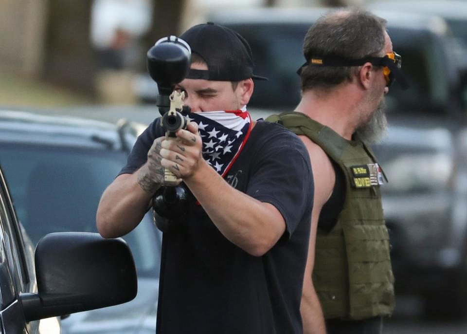 Members of the Proud Boys fire paintballs at antifascist counterprotesters and members of the media at an Aug. 10, 2021 Church at Planned Parenthood event outside Planned Parenthood in Salem.
